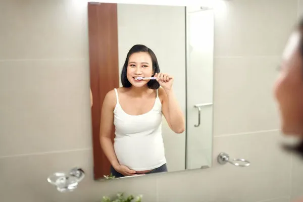 29282 pregnant woman teeth